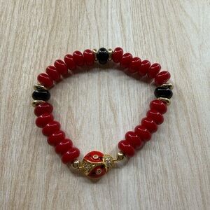 Red and Black Beaded Bracelet with Ladybug Charm